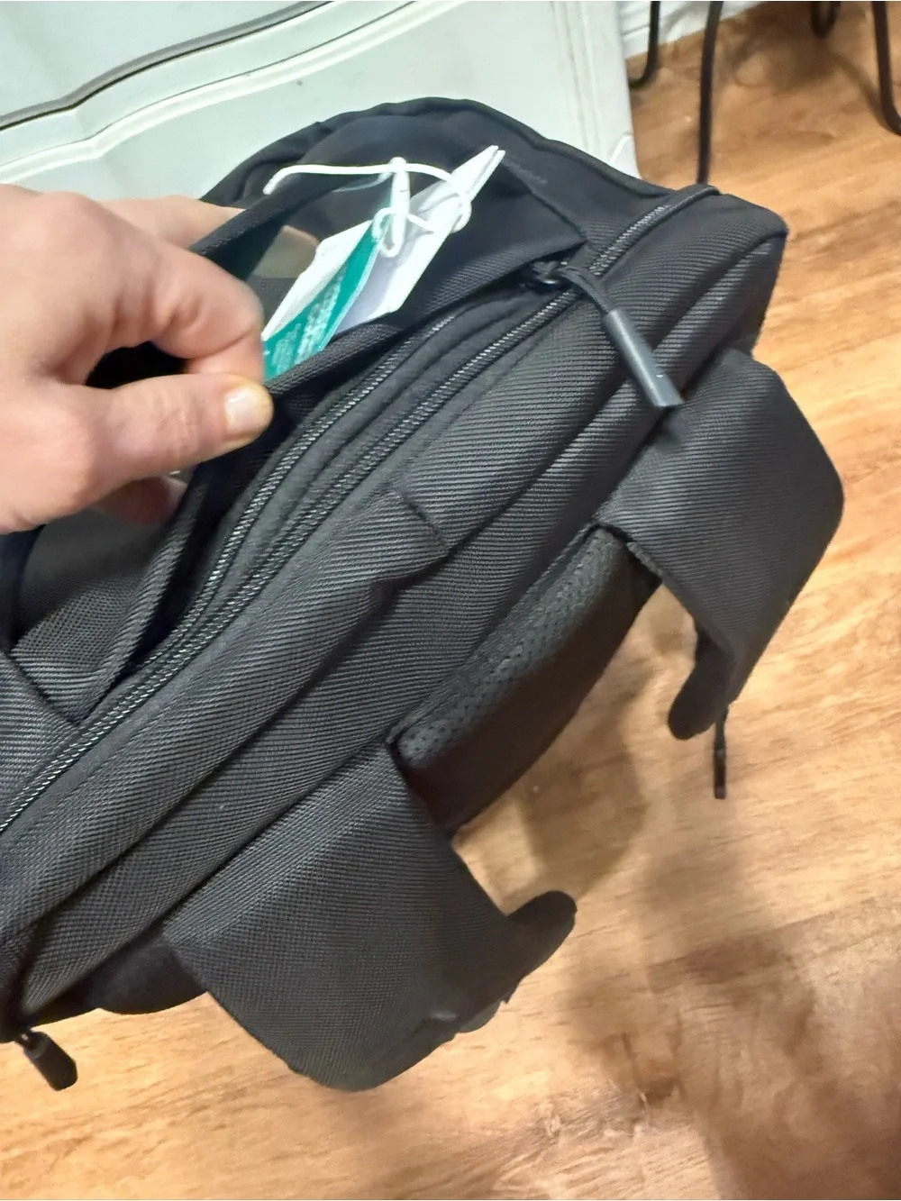 Tomtoc black backpack